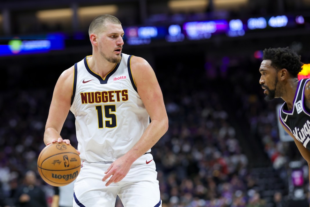 Nuggets superstar Nikola Jokic looks to make a play against the Kings during the 2024-25 NBA season.