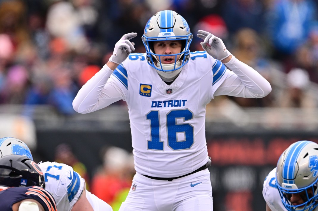 Lions quarterback Jared Goff changes a play against the Bears during the 2024 NFL season.