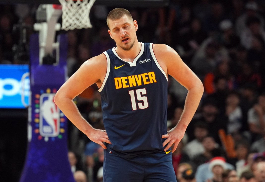 Nuggets superstar Nikola Jokic looks on against the Suns during the 2024-25 NBA season.