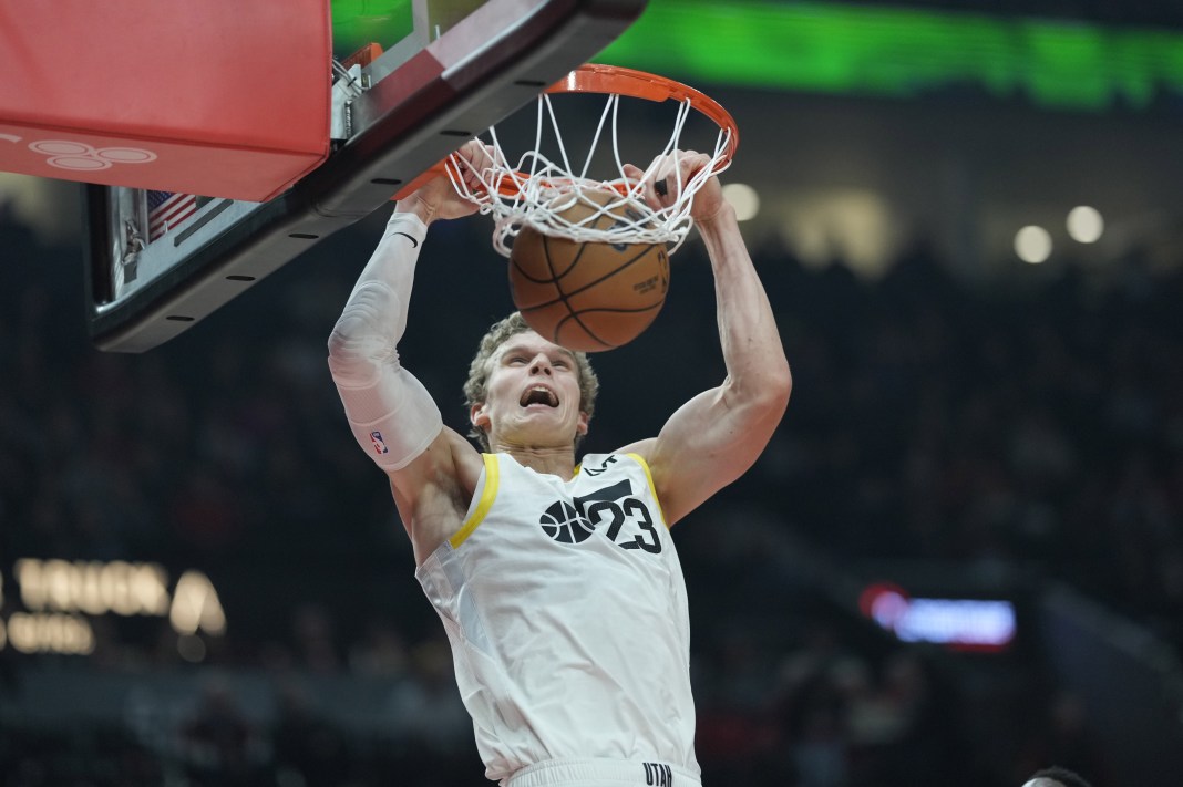 Jazz big man Lauri Markkanen dunks against the Blazers during the 2024-25 NBA season.