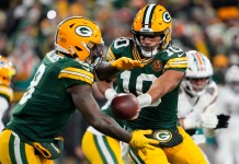 NFL First Touchdown Scorer Predictions for Week 7 reen Bay Packers quarterback Jordan Love hands the football off to running back Josh Jacobs