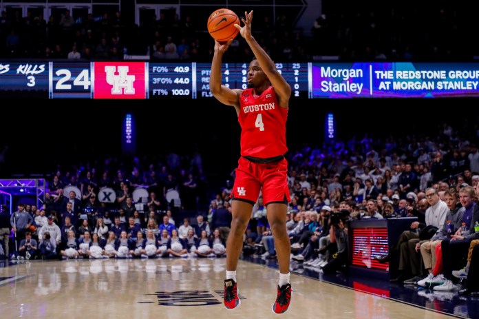 Houston Cougars guard LJ Cryer (4) shoots the ball during the first half against the Xavier Musketeers at Cintas Center on December 1, 2023