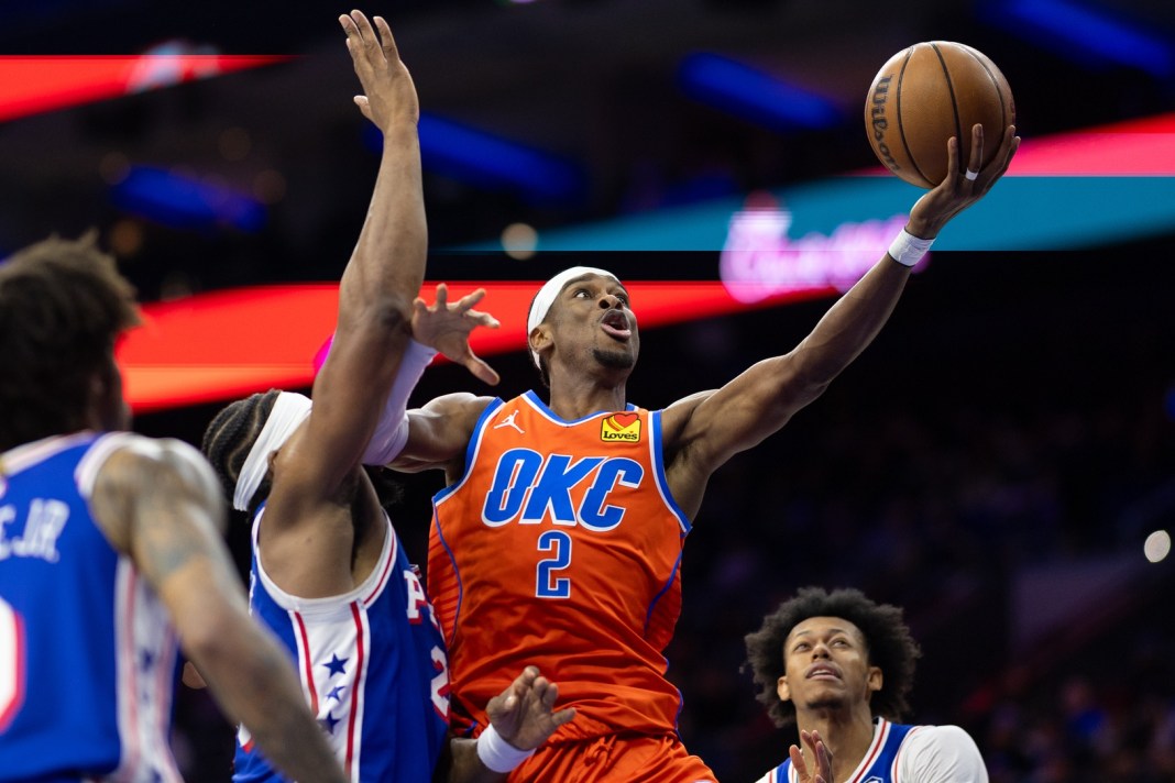 Oklahoma City Thunder guard Shai Gilgeous-Alexander (2) drives for a shot past Philadelphia 76ers forward Guerschon Yabusele (28) during the third quarter at Wells Fargo Center on January 14, 2025