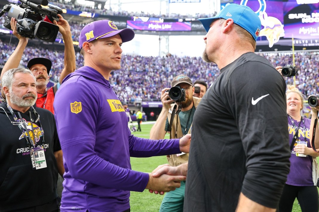 Vikings head coach Kevin O'Connell and Lions head coach Dan Campbell shake hands during the 2024 NFL season.