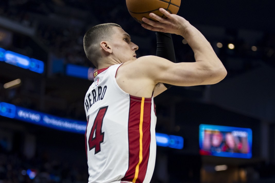 Heat guard Tyler Herro takes a shot against the Warriors during the 2024-25 NBA season.