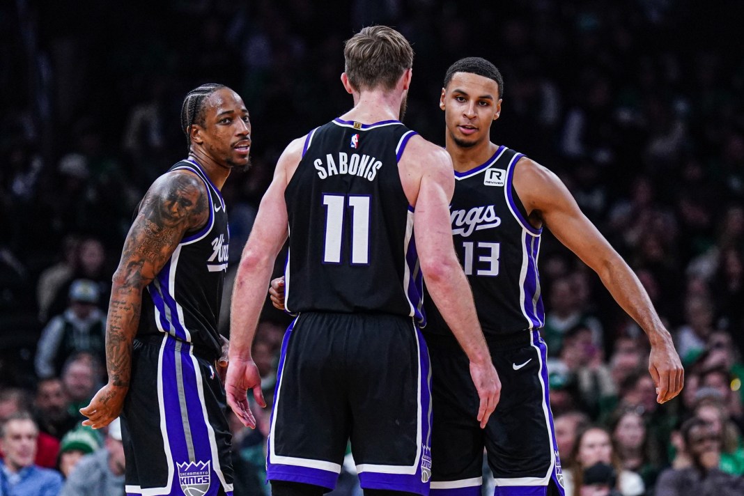 Kings center Domantas Sabonis celebrates a play with his teammates during the 2024-25 NBA season.