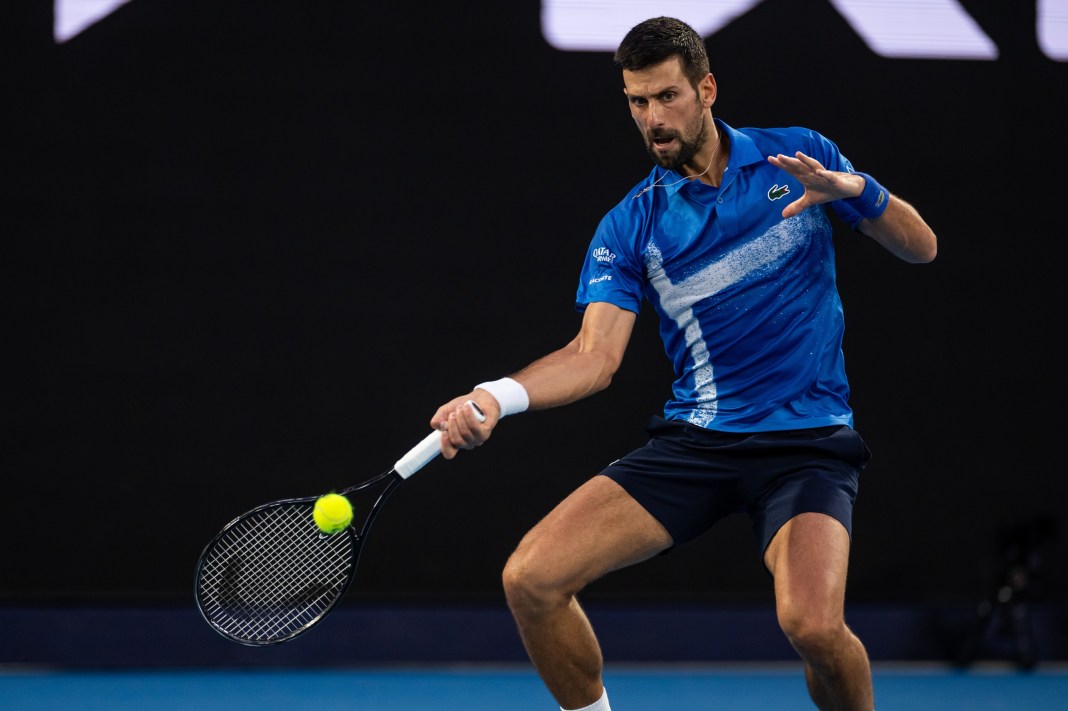 Novak Djokovic hits a forehand against Nishesh Basavareddy at the 2025 Australian Open.