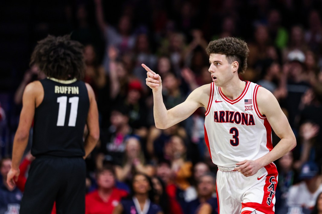 Arizona Wildcats guard Anthony Dell'Orso (3) points after making a three-point basket during the first half against the Colorado Buffaloes at McKale Center on January 25, 2025