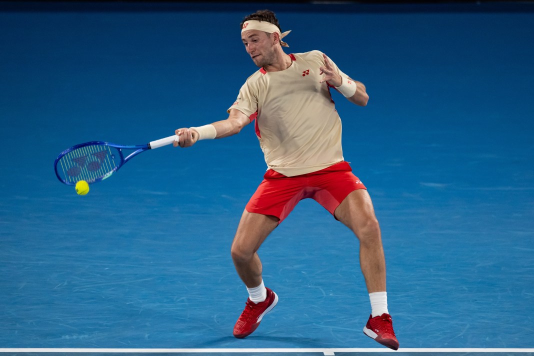 Casper Ruud hits a forehand in a match against Jaume Munar at the 2025 Australian Open.