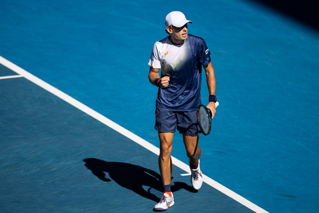 Alex de Minaur celebrates a point against Francisco Cerundolo at the 2025 Australian Open.