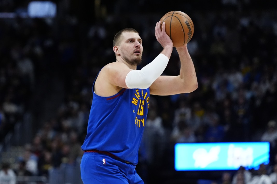 Nuggets superstar Nikola Jokic takes a shot against the Kings during the 2024-25 NBA season.