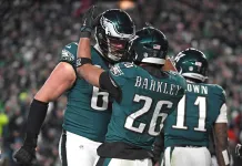 Week 10 NFL Betting Model Predictions Eagles star running back Saquon Barkley celebrates a touchdown with tackle Lane Johnson during the NFC Championship Game.