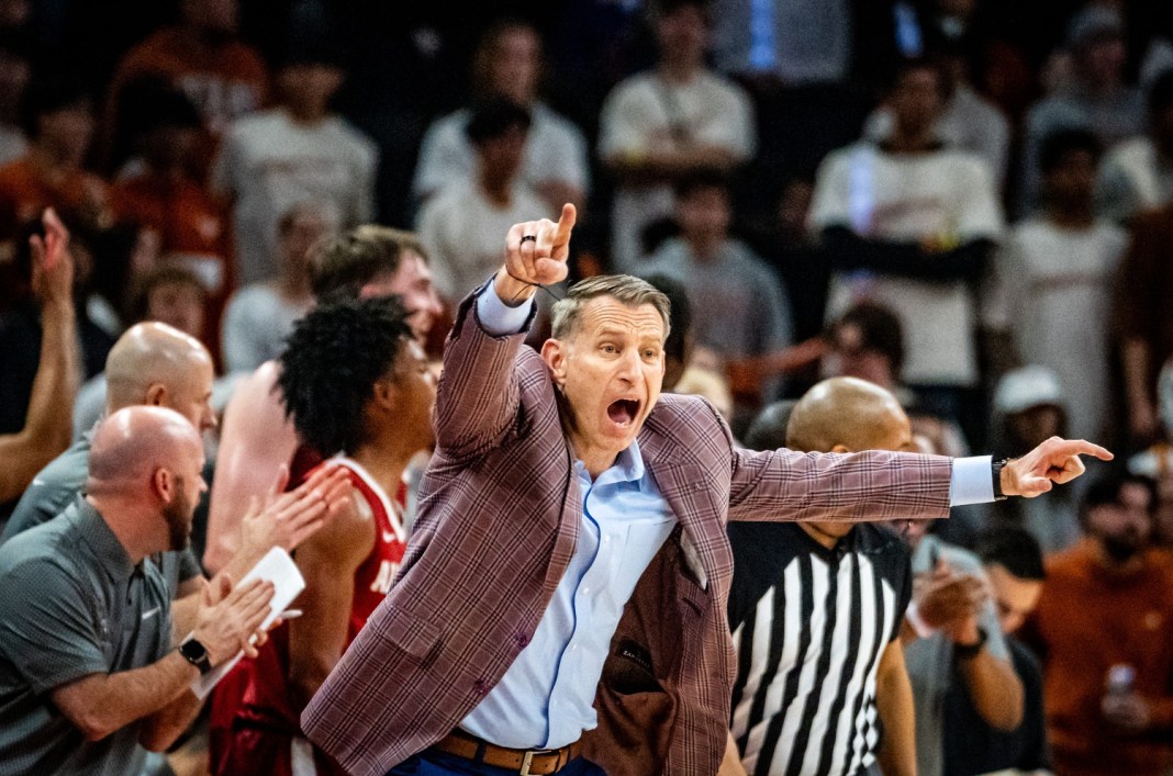 Alabama Crimson Tide head coach Nate Oats yells instructions to his team during the second half as the Texas Longhorns face off against the Crimson Tide at the Moody Center on February 11, 2025