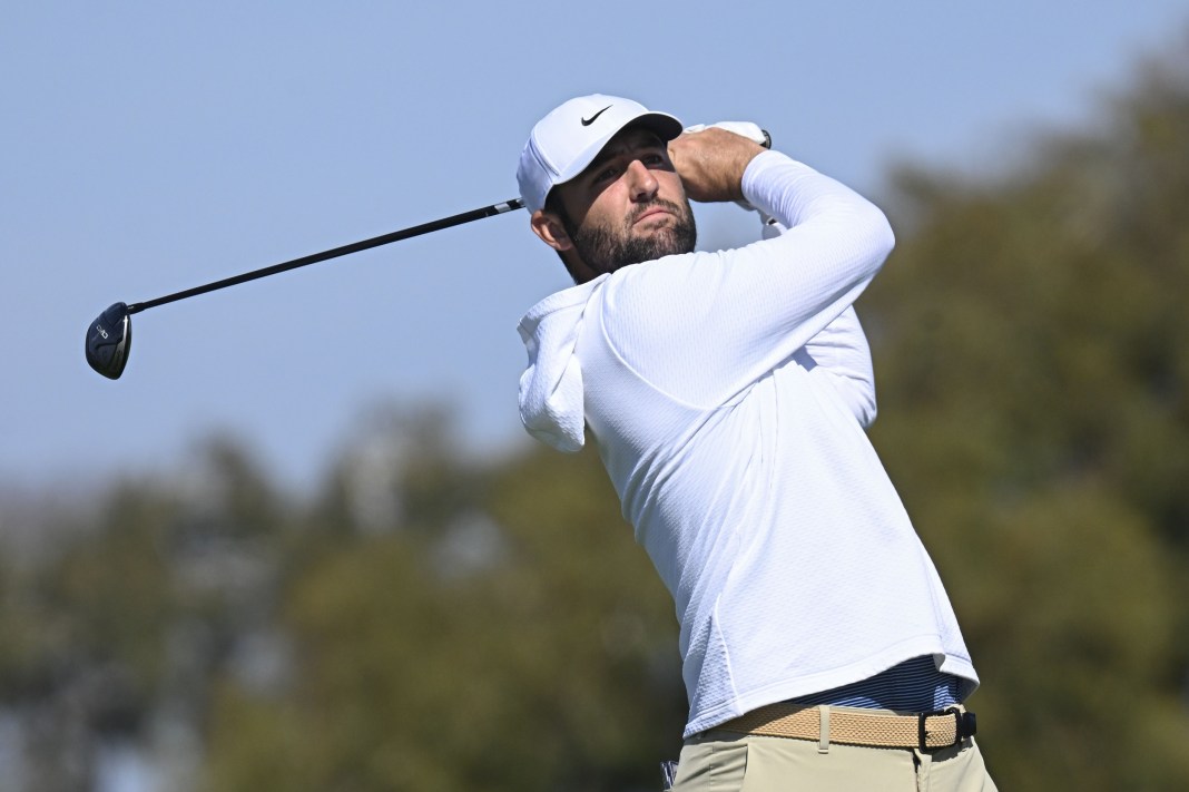 Scottie Scheffler hits a tee shot at The Genesis Invitational.