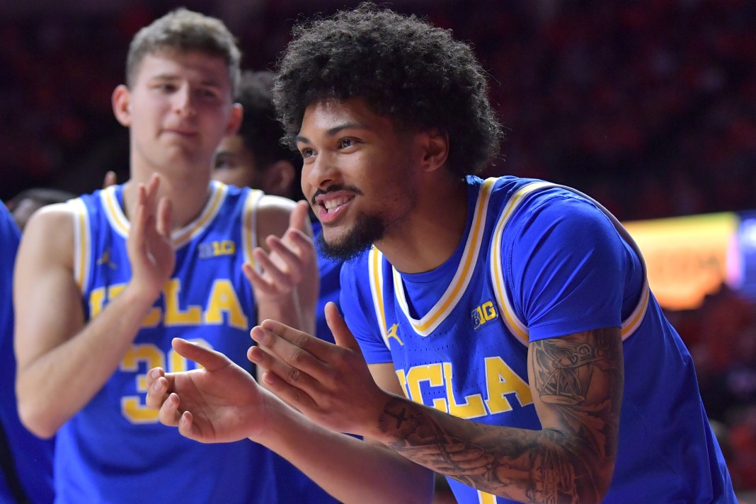 UCLA Bruins guard Christian Horry (7) gives teammates a hand during the second half against the Illinois Fighting Illini at State Farm Center on February 11, 2025.