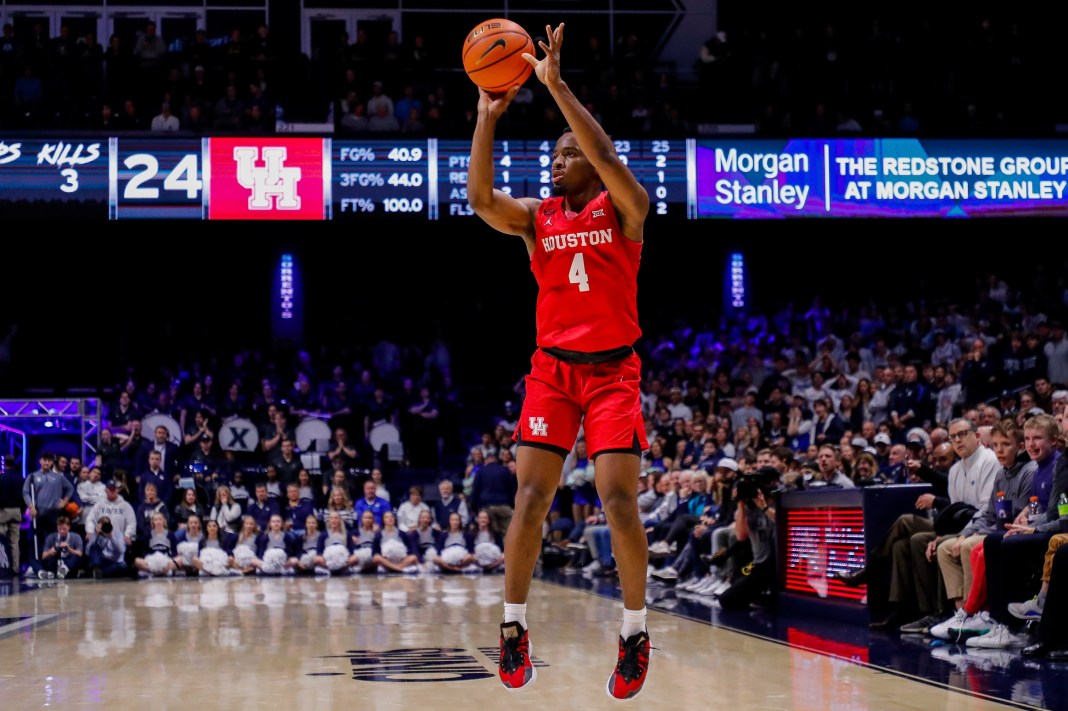 Houston guard LJ Cryer takes a jumper against Cincinnati during the 2024-25 college basketball season.