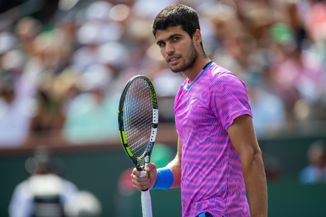 Carlos Alcaraz reacts to a big point in the Indian Wells final against Daniil Medvedev in 2024.