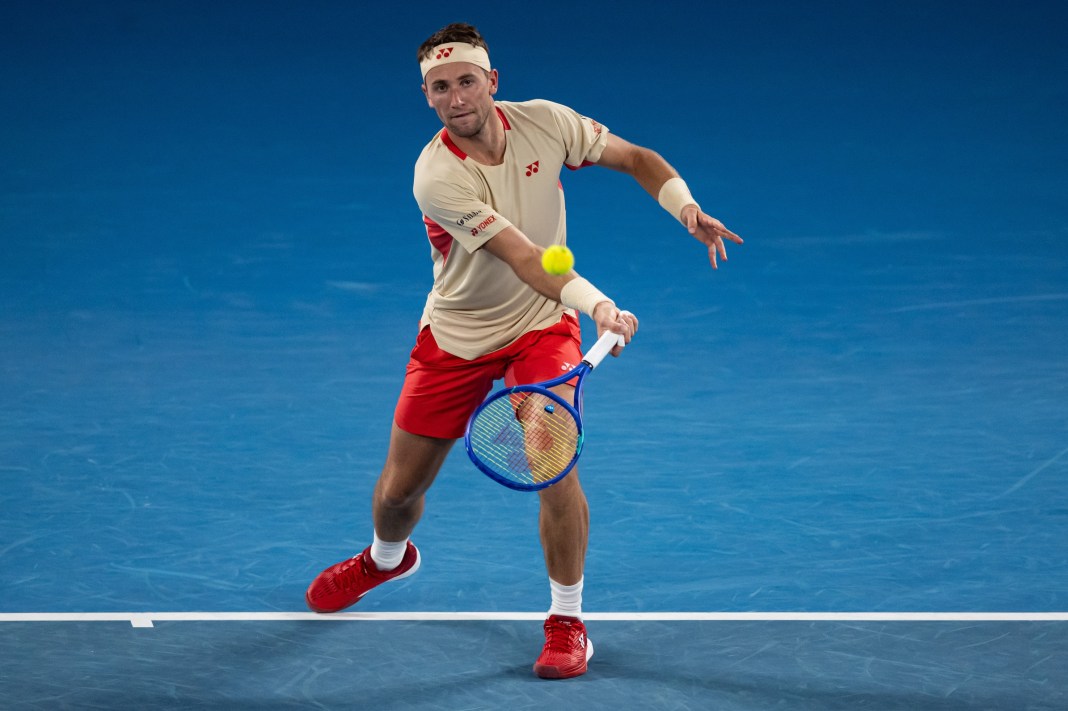 Casper Ruud hits a slice forehand against Jaume Munar at the 2025 Australian Open.