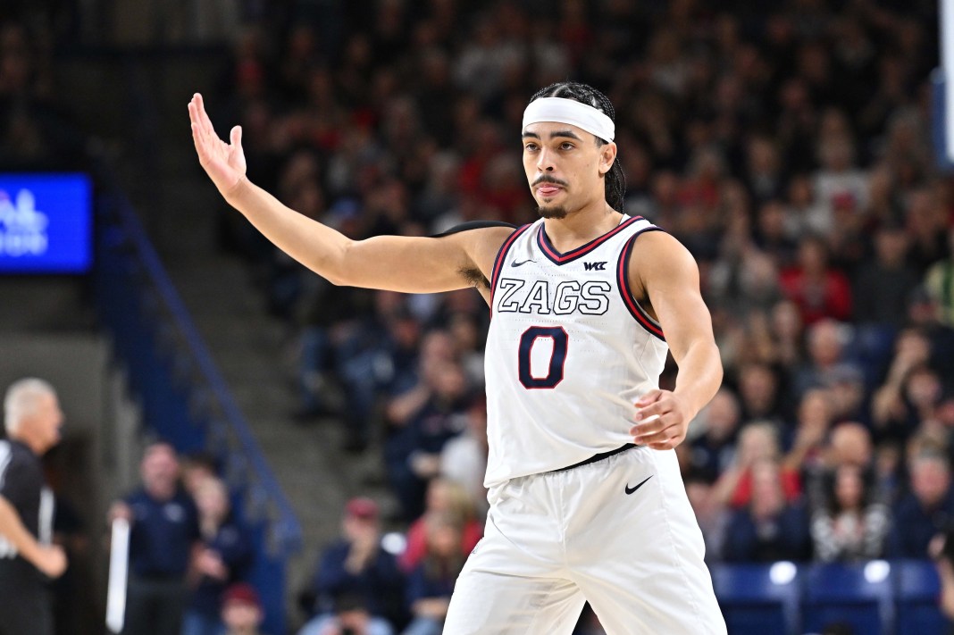 Gonzaga guard Ryan Nembhard pumps up the crowd in a meeting with St. Mary's during the 2024-25 college basketball season.