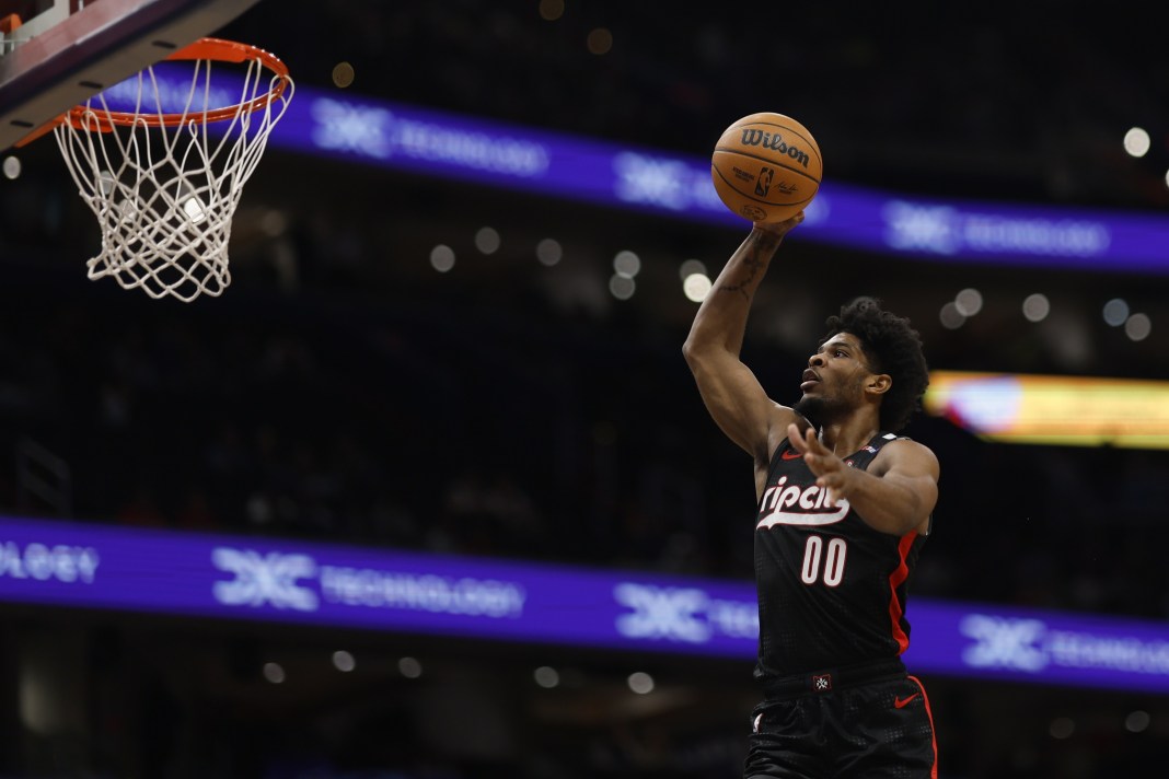 Blazers guard Scoot Henderson goes up for a shot against the Wizards during the 2024-25 NBA season.