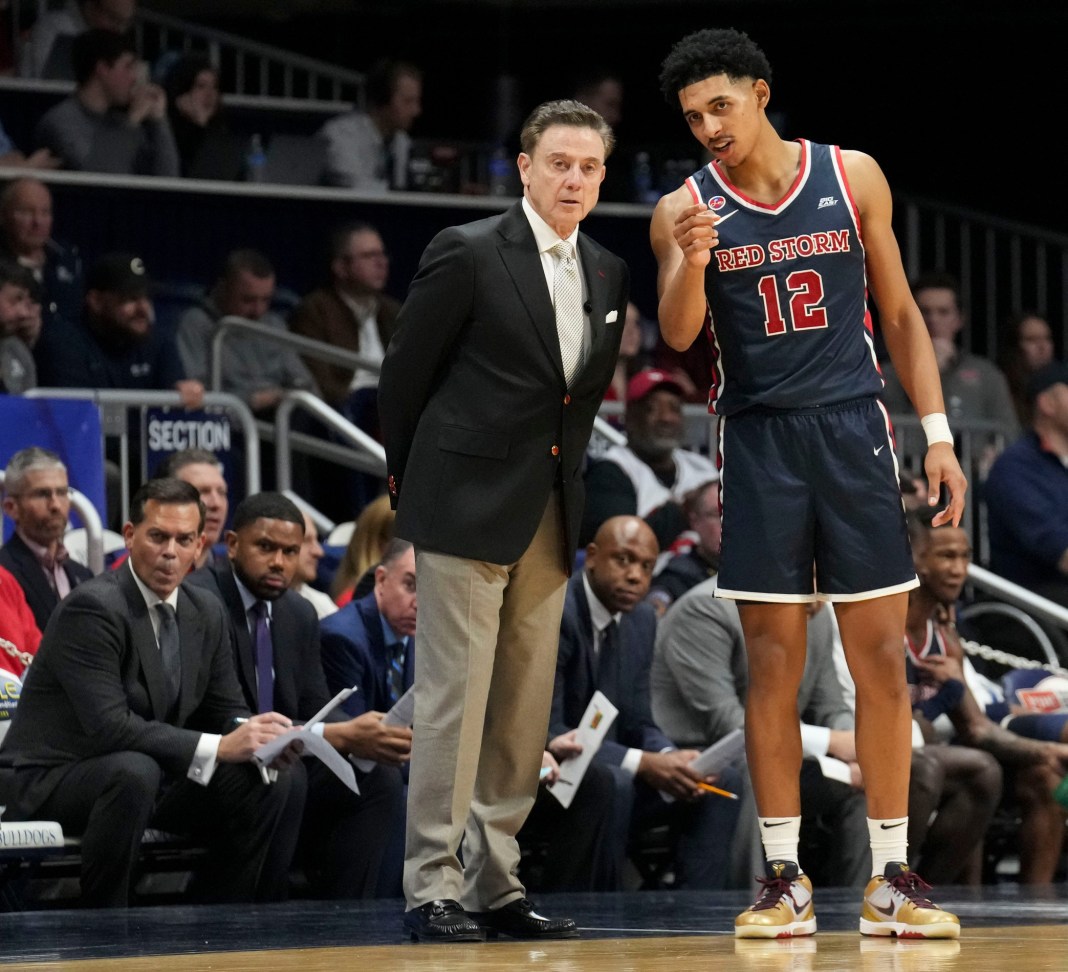 St. John's coach Rick Pitino talks to star RJ Luis Jr. during the 2024-25 college basketball season.