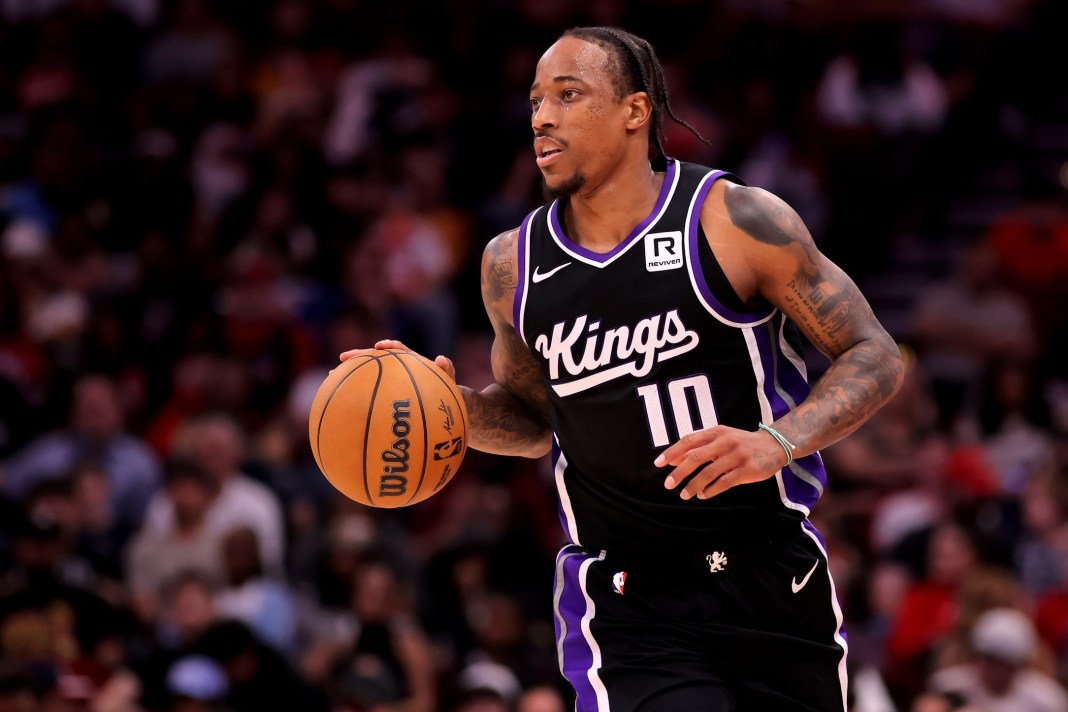 King forward DeMar DeRozan brings the ball up against the Rockets during the 2024-25 NBA season.