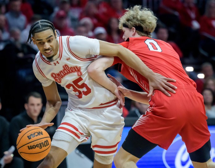 Bradley’s Darius Hannah (35) tries to make a move on ISU’s Jack Daugherty in the first half of their MVC basketball game on January 25, 2025, at Carver Arena in Peoria. The Braves defeated their I-74 rivals 61-57.