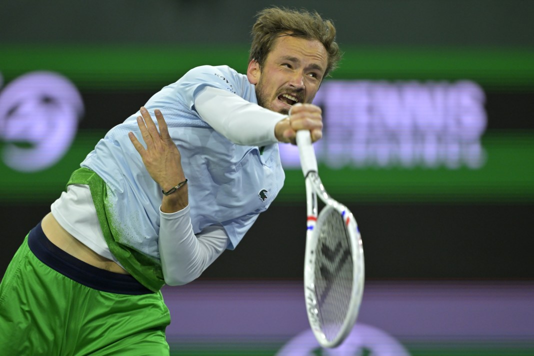 Daniil Medvedev serves in his opening-round match at Indian Wells in 2025.