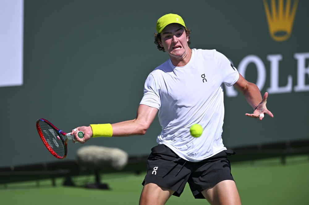 Joao Fonseca hits a forehand against Jack Draper at the 2025 BNP Paribas Open in Indian Wells.