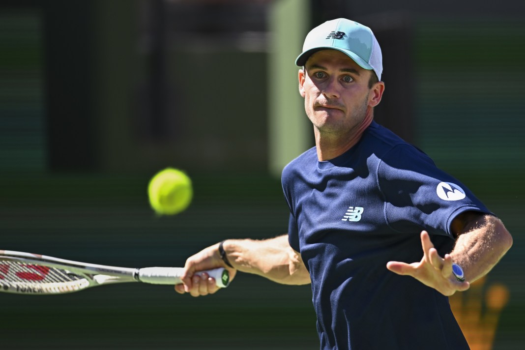 Tommy Paul hits a forehand against Cameron Norrie at Indian Wells in 2025.