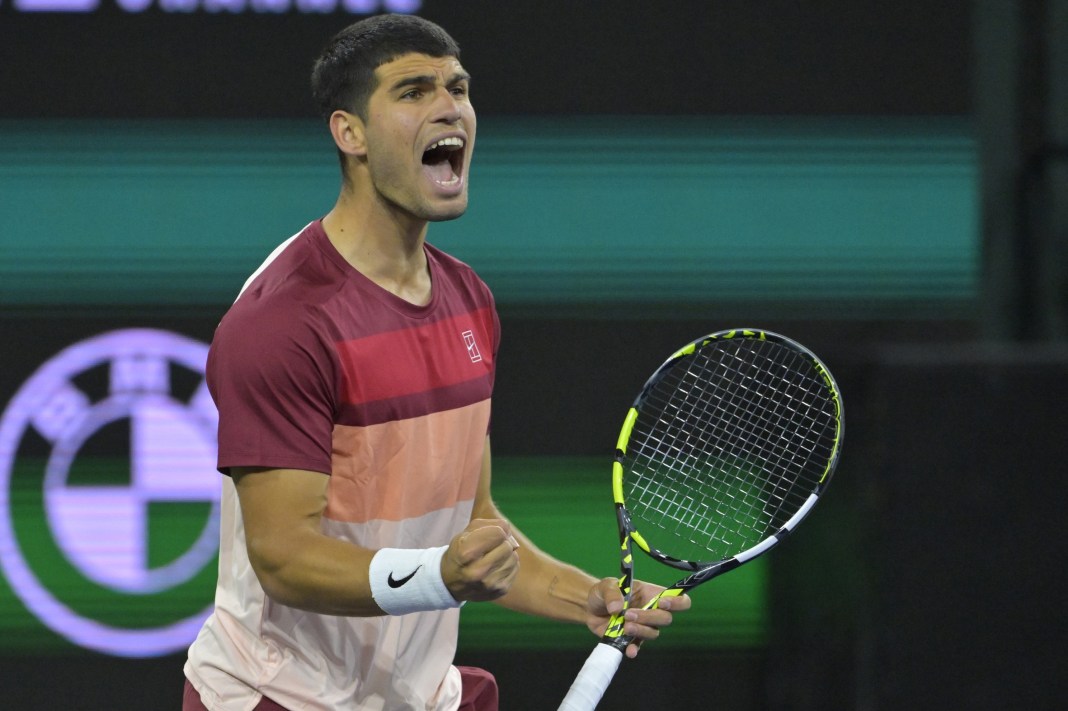 Carlos Alcaraz celebrates a big point against Francisco Cerundolo at the 2025 BNP Paribas Open at Indian Wells.