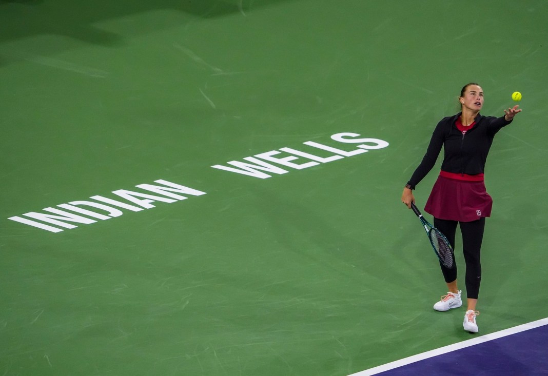 Aryna Sabalenka serves against Madison Keys at the 2025 BNP Paribas Open in Indian Wells.