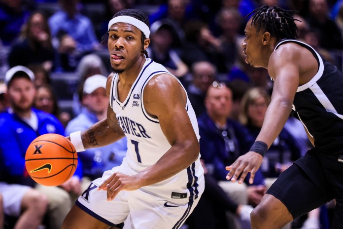 Xavier Musketeers guard Ryan Conwell (7) dribbles against the Providence Friars in the first half at Cintas Center on March 8, 2025.