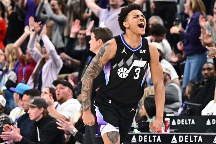 Jazz guard Keyonte George celebrates a basket against the Blazers during the 2024-25 NBA season.