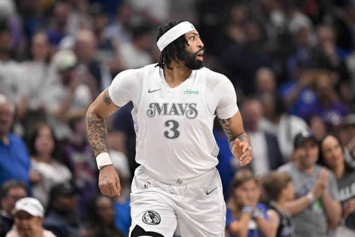 Mavericks star Anthony Davis runs up the court in a meeting with the Raptors during the 2024-25 NBA season.