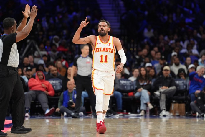 Hawks star Trae Young celebrates a made bucket against the Magic during the 2024-25 NBA season.