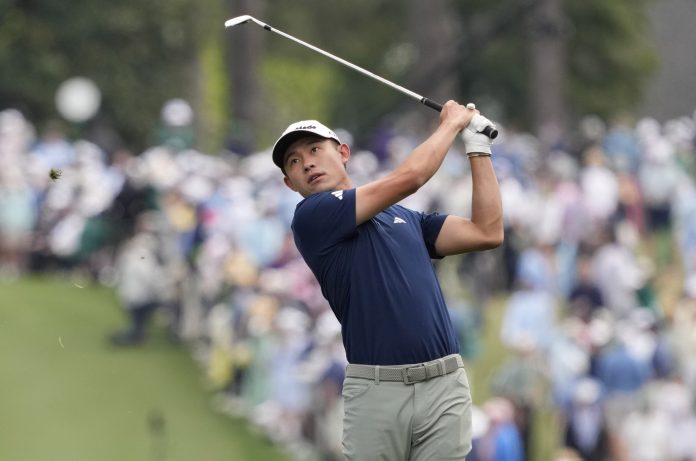 Collin Morikawa plays a shot on the first hole during the third round of the Masters Tournament at Augusta National Golf Club in Augusta, Georgia, on April 12, 2025.