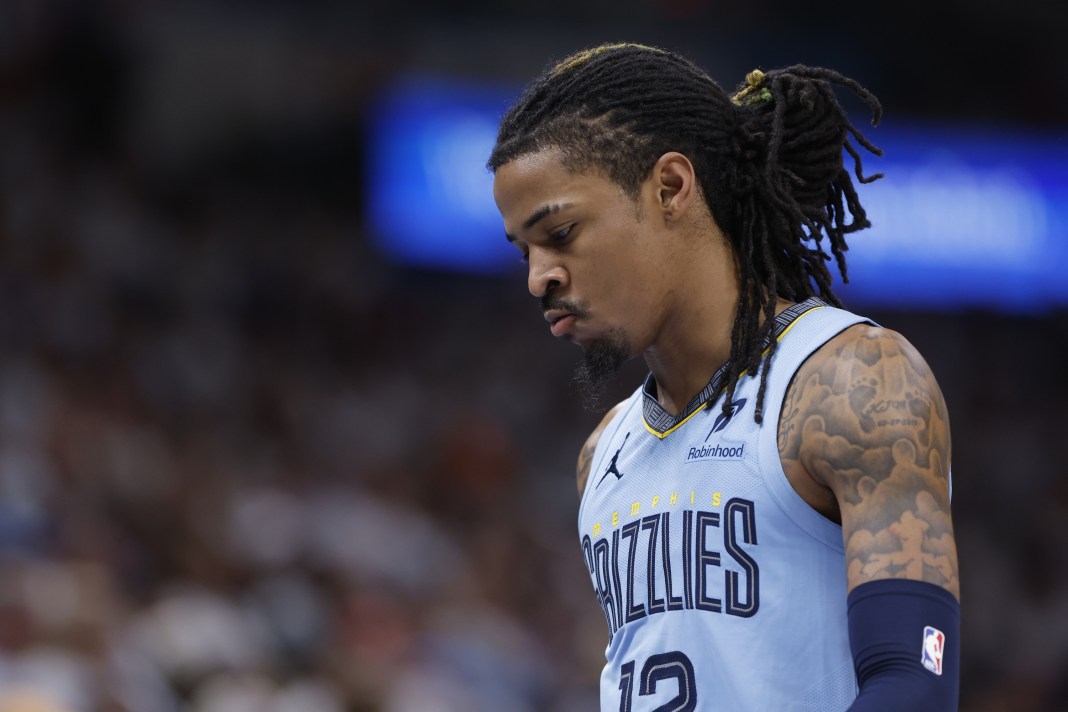 Grizzlies star Ja Morant looks down in a blowout loss to the Thunder in Game 1 of the 2024-25 NBA Playoffs.