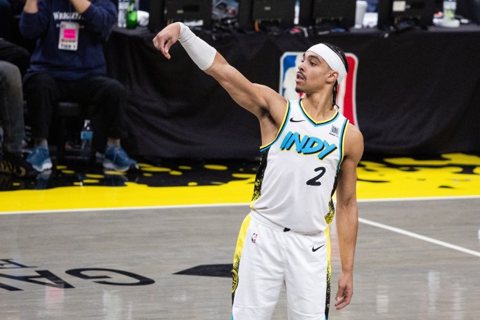 Pacers guard Andrew Nembhard poses after a shot against the Bucks in the 2024-25 NBA Playoffs.