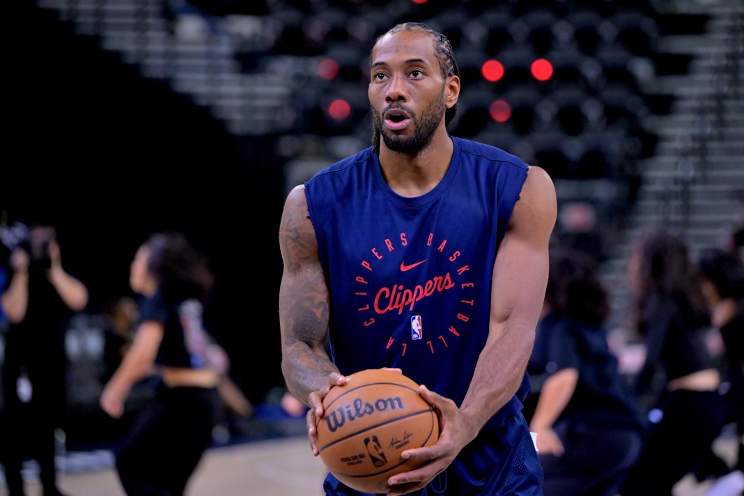 Clippers forward Kawhi Leonard warms up against the Nuggets during the 2024-25 NBA Playoffs.