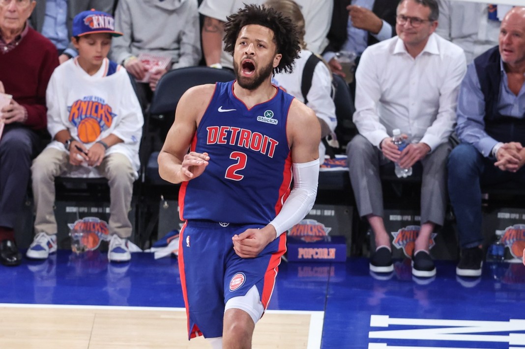 Pistons star Cade Cunningham celebrates a basket against the Knicks during the 2024-25 NBA Playoffs.
