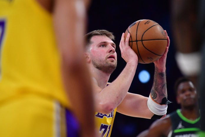 Los Angeles Lakers guard Luka Doncic (77) shoots a free throw against the Minnesota Timberwolves during the first half of game five in the first round of the 2025 NBA Playoffs at Crypto.com Arena in Los Angeles, California, on April 30, 2025.