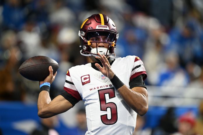 Washington Commanders quarterback Jayden Daniels (5) warms up prior to the game against the Detroit Lions in a 2025 NFC Divisional Round game at Ford Field in Detroit, Michigan, on January 18, 2025.