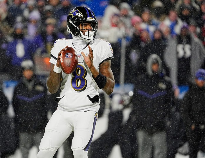 Ravens star Lamar Jackson looks to throw during the 2024 NFL season.