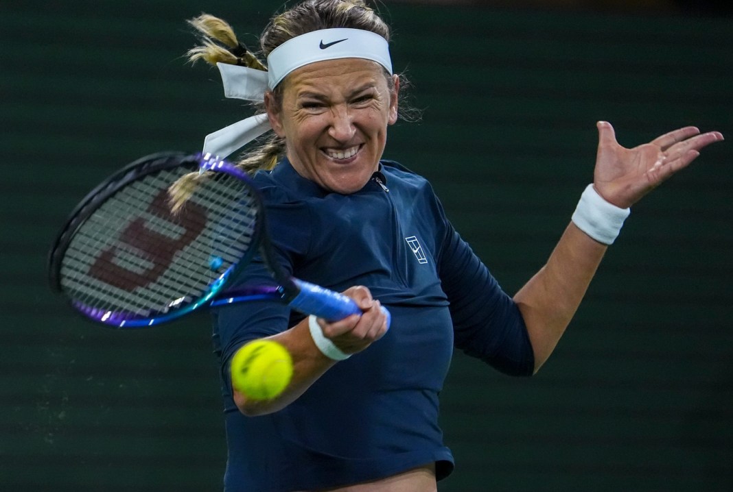 Victoria Azarenka hits a forehand at the BNP Paribas Open at Indian Wells.