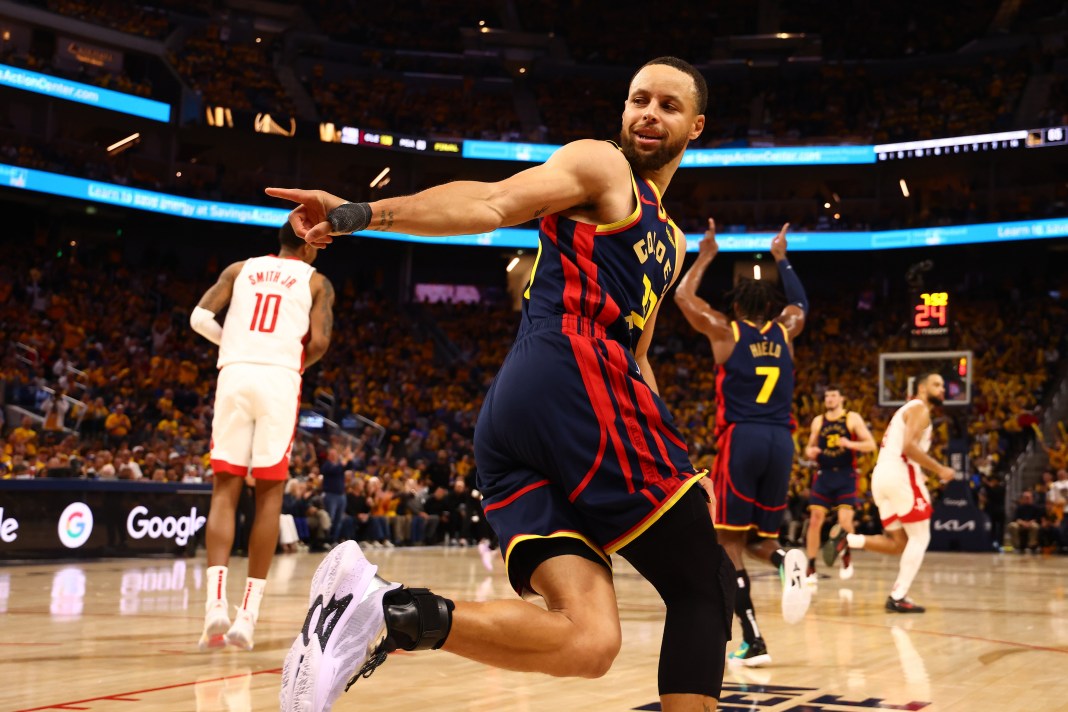 Warriors star Stephen Curry reacts to a basket against the Rockets during the 2024-25 NBA Playoffs.