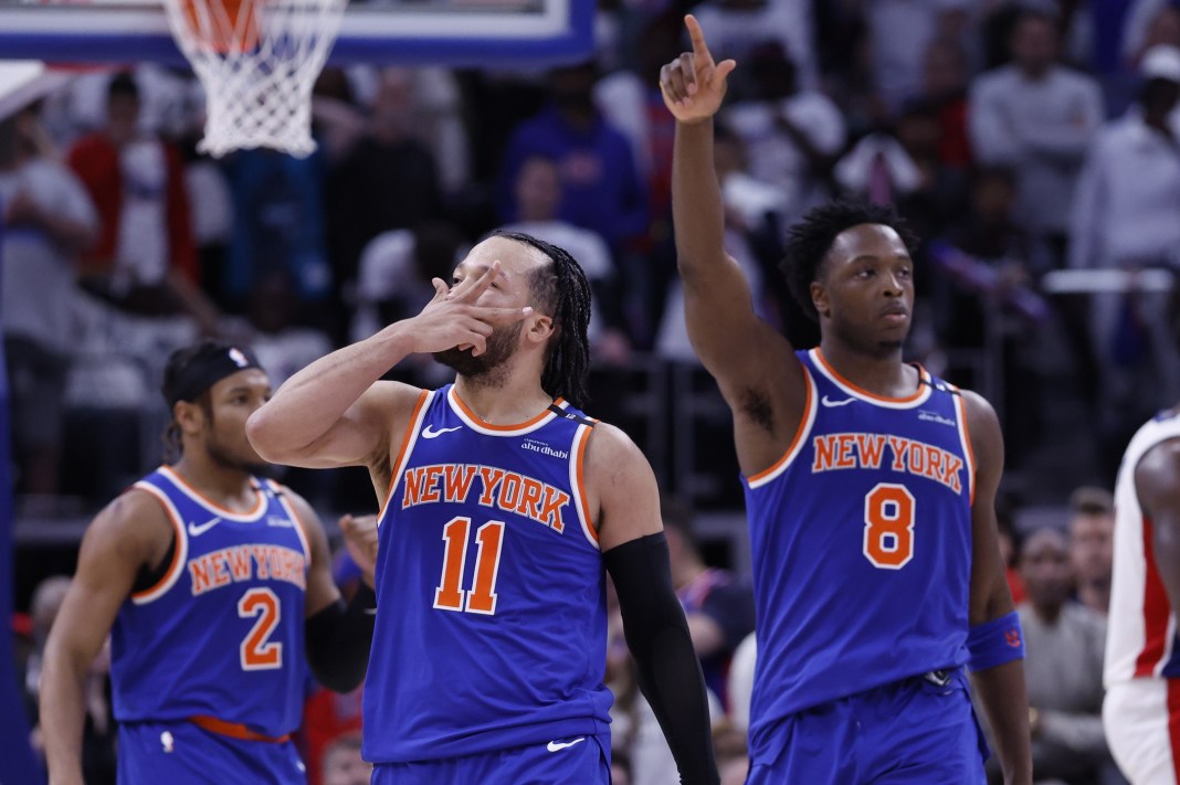 Knicks star Jalen Brunson celebrates with teammates after hitting a big shot against the Pistons during the 2024-25 NBA Playoffs.