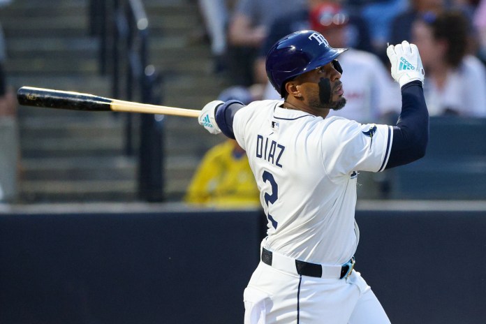 Tampa Bay Rays designated hitter Yandy Diaz (2) hits a two-run home run during the fourth inning of the game against the Philadelphia Phillies at George M. Steinbrenner Field in Tampa, Florida, on May 6, 2025.