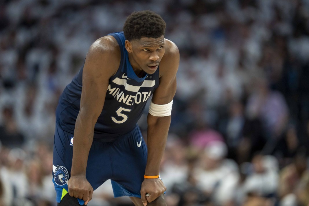 Timberwolves star Anthony Edwards rests against the Warriors during the 2024-25 NBA Playoffs.