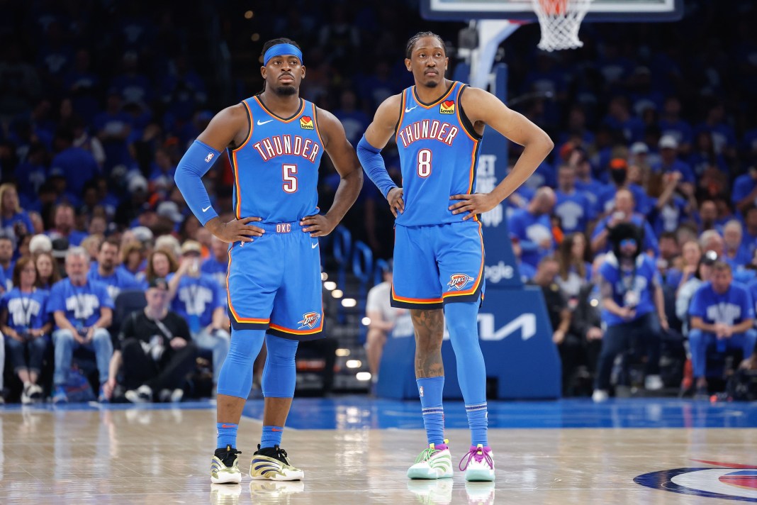 Thunder wings Jalen Williams and Luguentz Dort look on against the Nuggets during the 2024-25 NBA Playoffs.